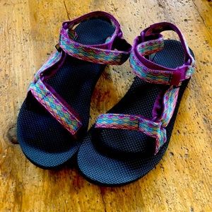New, never worn Teva sandals.